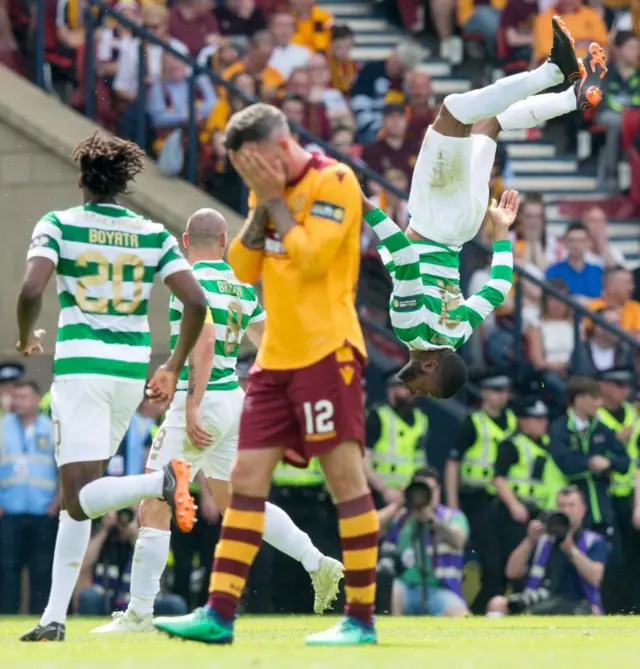 Olivier Ntcham does a somersault to celebrate scoring for Celtic