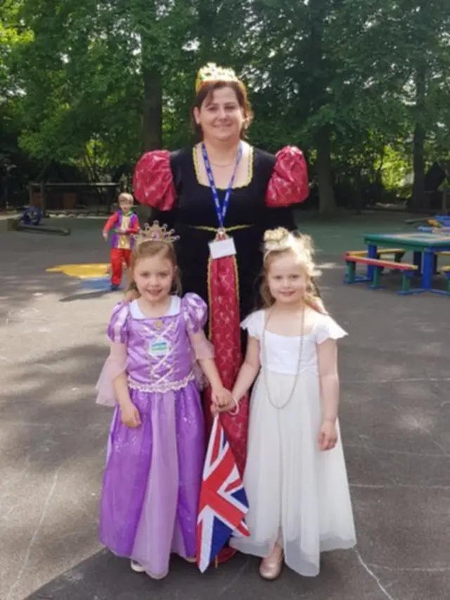 Surrey Headteacher Mrs Creasey and two of her students Rosie and Olivia