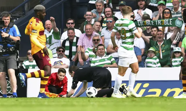 Assistant referee Douglas Ross falls over during the Scottish Cup final