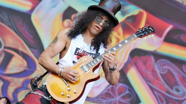 Slash playing a Gibson guitar