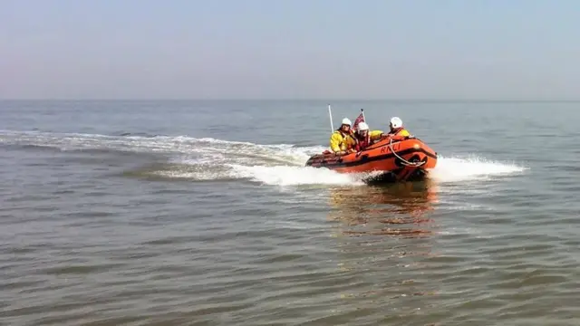 RNLI lifeboat with crew on board