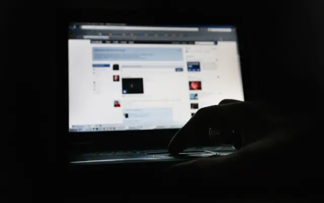 In this photo illustration the Social networking site Facebook is displayed on a laptop screen