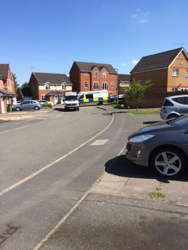 Police vans in Thorpe Astley