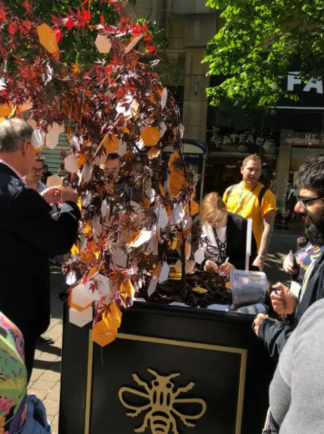 Messages tied to maple tree