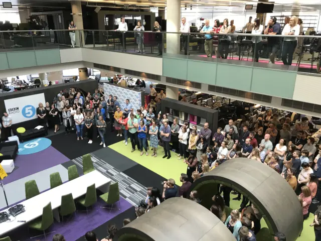 BBC MediaCityUK staff mark the minute's silence in Salford