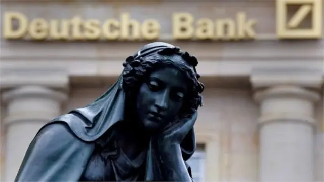 Statue in front of Deutsche Bank building