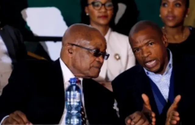 Supra Mahumapelo (R) and  ex-President Zuma (L), in archive shot