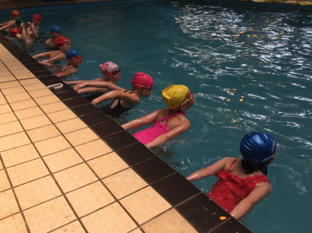 young children in swimming pool