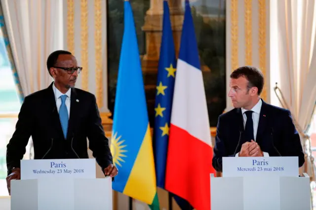 French President Emmanuel Macron (R) and Rwandan President Paul Kagame hold a joint press conference after their meeting at the Elysee Palace in Paris, on May 23, 2018.