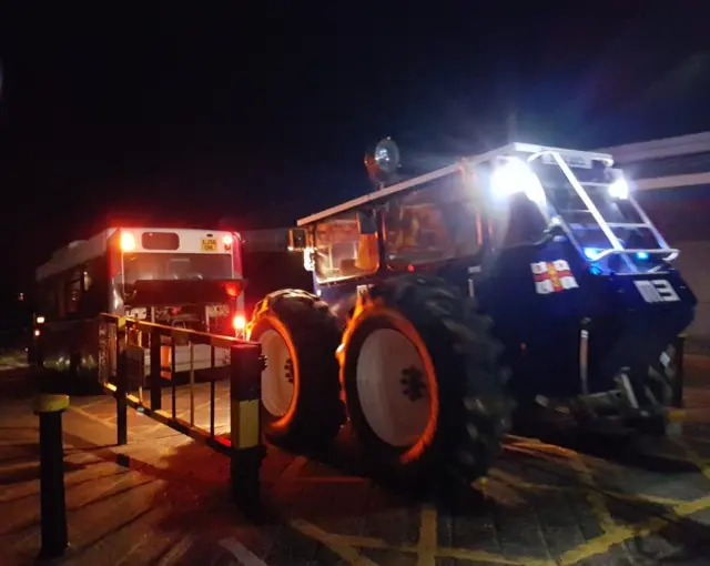 Bus being towed by RNLI