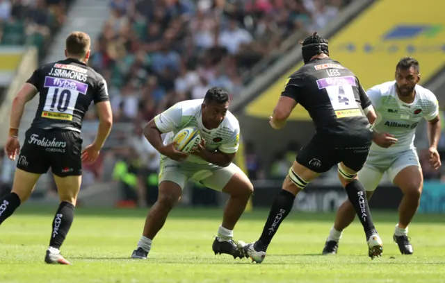 Mako Vunipola of Saracens takes on Mitch Lees of Exeter