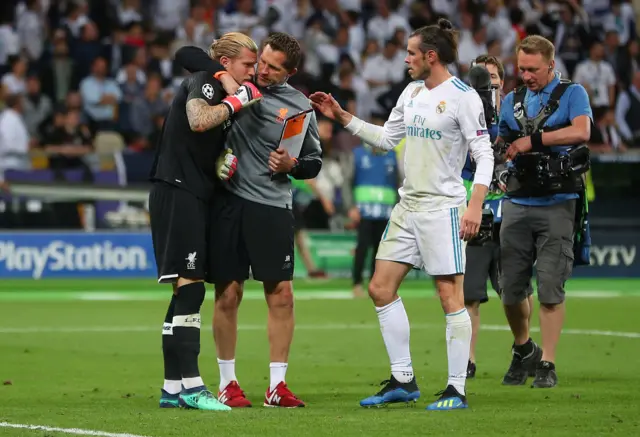 Real Madrid"s Gareth Bale consoles Liverpool"s Loris Karius