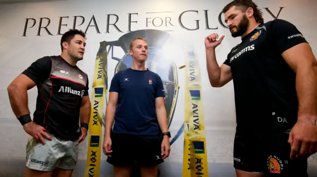 Brad Barritt of Saracens and Don Armand of Exeter Chiefs make the toss with Wayne Barnes