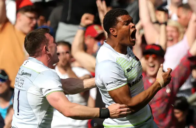 Nathan Earle celebrates his try