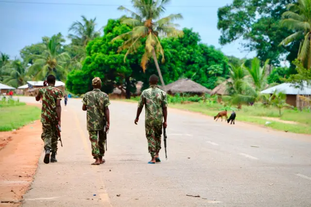 Soldiers from the Mozambican army patrol the streets after security in the area was increased, following a two-day attack from suspected Islamists in October last year, on March 7, 2018 in Mocimboa da Praia, Mozambique.