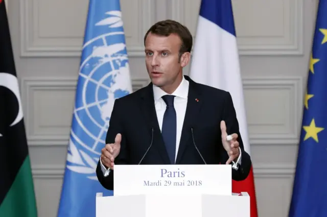 French President Emmanuel Macron speaks during a press conference with Chairman of the Presidential Council of Libya, Fayez al-Sarraj and UN Special Envoy for Libya Ghassan Salame (both unseen) after the International conference on Libya at the Elysee Palace in Paris, France, 29 May 2018.