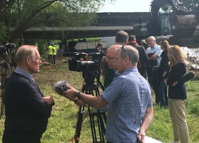 Richard Lee speaking to the media