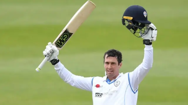 Wayne Madsen of Derbyshire celebrates reaching his century