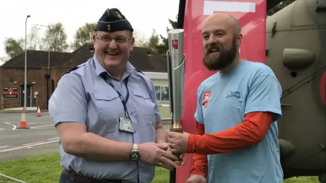 Baton supporters with RAF 100 baton