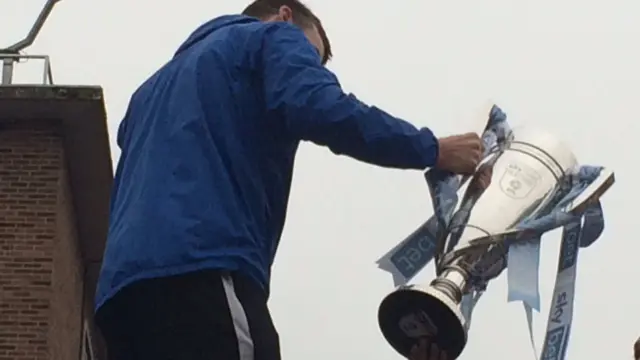 The play-off trophy on the bus