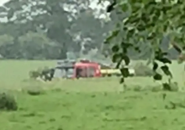 Helicopter in field