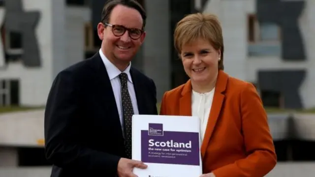 Andrew Wilson handed over the report to SNP leader Nicola Sturgeon earlier this week