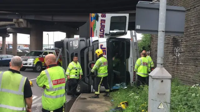 Emergency crews around the lorry