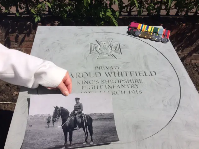 Photo of Geraint Whitfield and his plaque