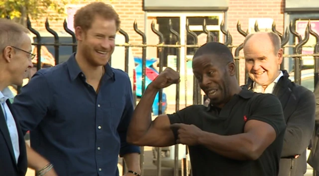 Trevor Rose with Prince Harry