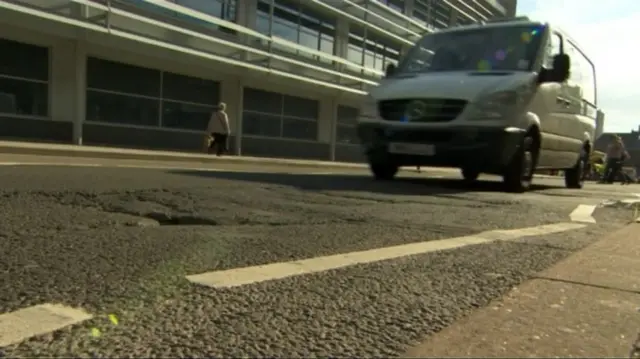 Pot hole in the road