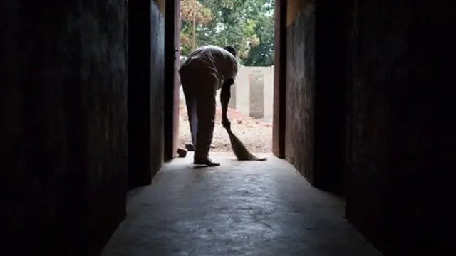 A man sweeping