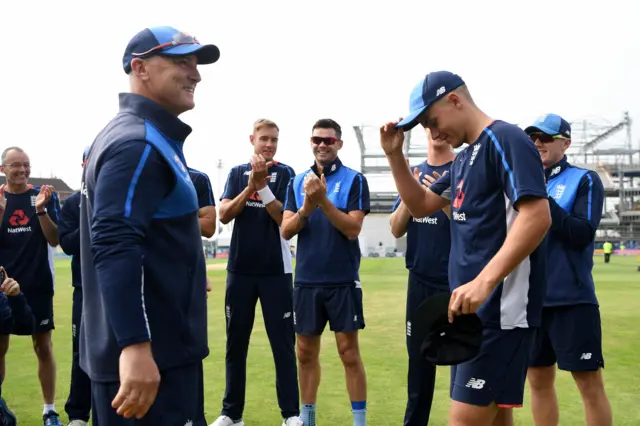 Sam Curran receives his England cap from Graham Thorpe