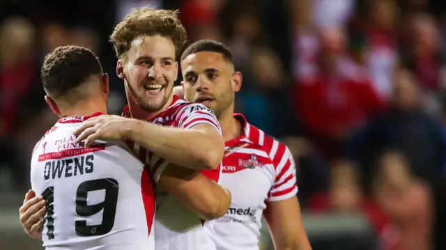 Leigh's Ben Reynolds celebrates with Jack Owens.