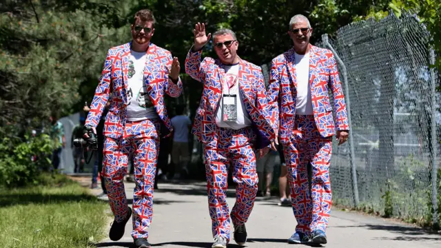 Fans wearing union jack suits