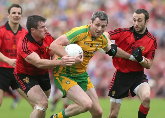 Donegal's Christy Toye in action against Down's Conor Laverty and Liam Doyle in the 2012 Ulster final