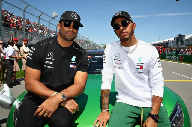 Lewis Hamilton with Seattle Seahawks Quarterback Russell Wilson