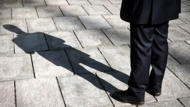 Man and his shadow