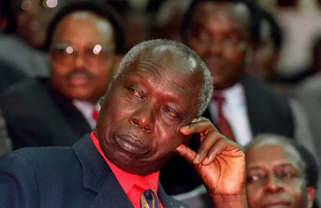 Daniel Arap Moi, Kenya's President and leader of the ruling Kenyan African National Union (KANU) party shown in a picture dated 28 December 1992 as he listens to his supporters during KANU election meeting