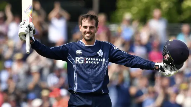 Calum MacLeod celebrates his century against England