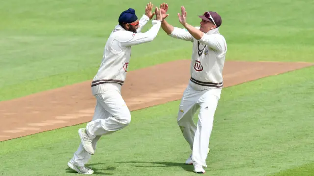 Amar Virdi has taken two wickets for Surrey