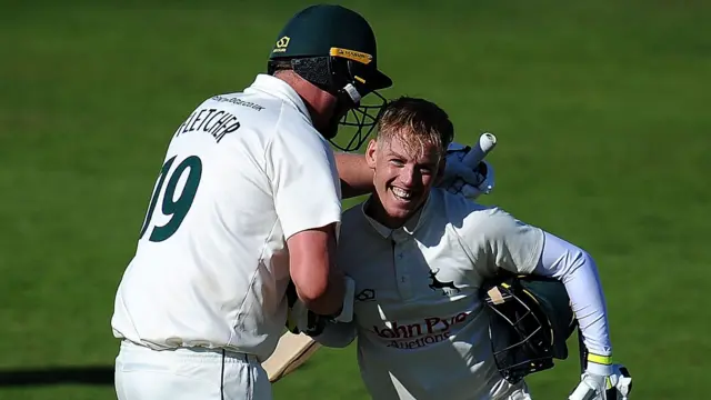 Tom Moores is congratulated by team-mate Luke Fletcher