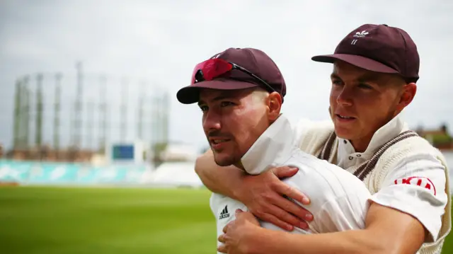 Rory Burns (left) and Surrey team-mate Sam Curran