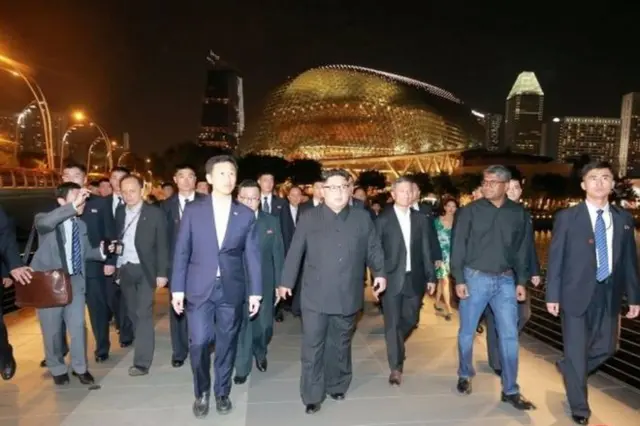 Kim Jong-un and entourage with Singaporean officials at Marina Bay