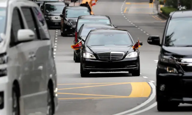 The motorcade of North Korean leader Kim Jong Un travels towards Sentosa for his meeting with U.S. President Donald Trump, in Singapore