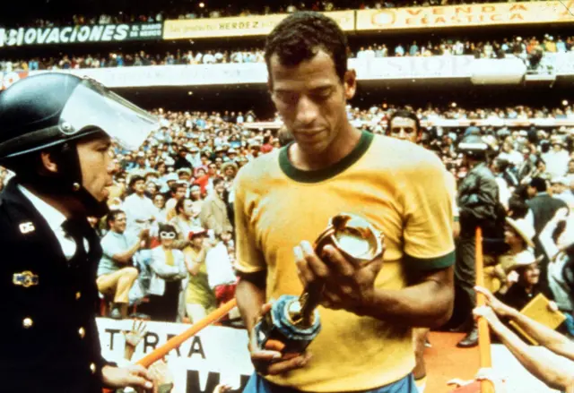 Brazil's Carlos Alberto with the 1970 World Cup trophy