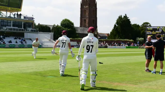 Matt Renshaw and Eddie Byrom walk out to bat