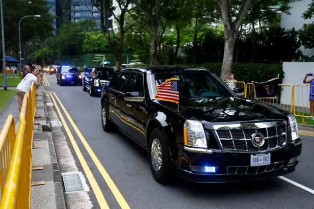 The motorcade of U.S. President Donald Trump travels towards Sentosa for his meeting with North Korean leader Kim Jong Un, in Singapore