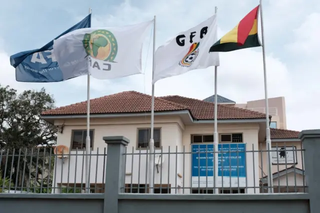 Flags flutter next to the premises of Ghana Football Association in Accra, Ghana June 8, 2018