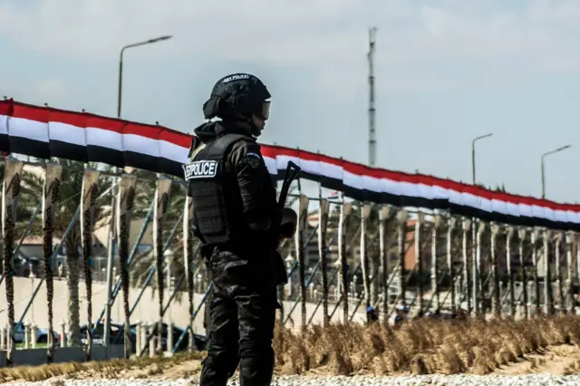 an Egyptian policeman standing guard in the new city of el-Alamien, west of Alexandria