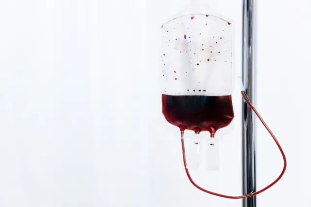 Blood bag hanging from a stand